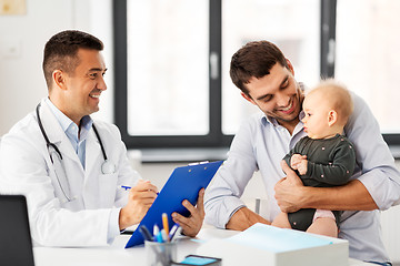 Image showing father with baby and doctor at clinic