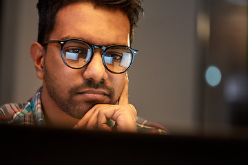 Image showing close up of creative man working at night office