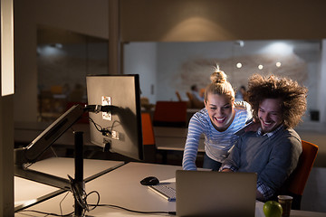 Image showing young designers in the night office