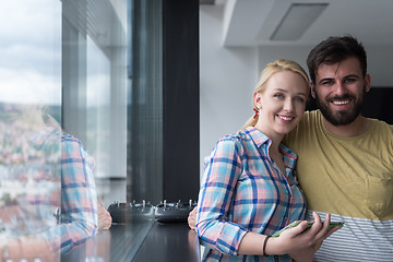 Image showing Business People Working With Tablet in startup office