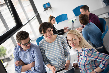 Image showing group of Business People Working With Tablet in startup office