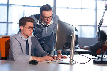 Image showing Two Business People Working With computer in office