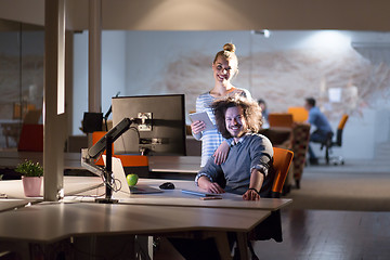 Image showing young designers in the night office