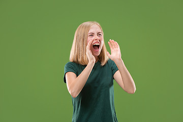 Image showing A portrait of surprised screaming woman