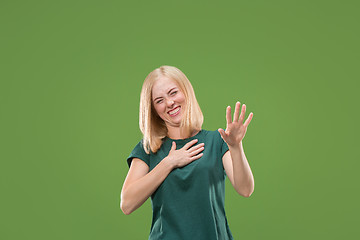 Image showing happy woman. image of female model on green