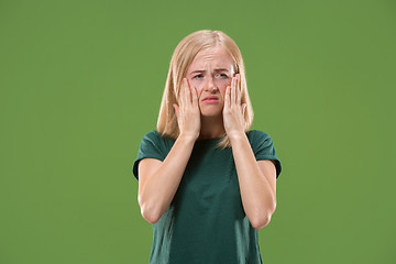 Image showing Beautiful woman looking sad and bewildered