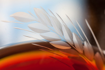 Image showing Detail of a glass with red wine and bubbles