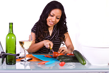 Image showing Beautiful Girl Cooking in the Kitchen