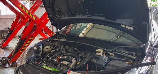 Image showing Car service repair inside garage