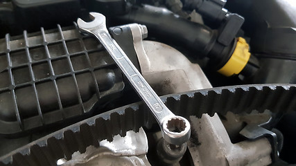 Image showing Spanner and timing belt on car engine