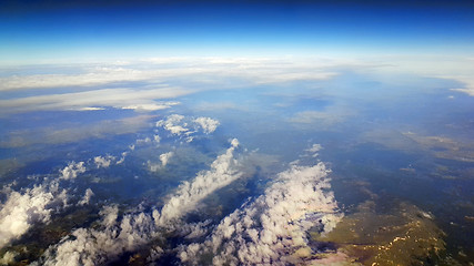 Image showing Clouds and land below