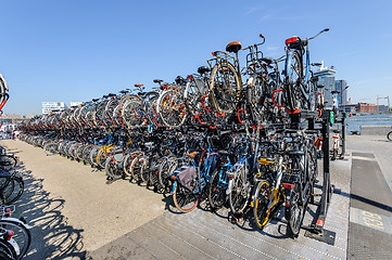 Image showing AMSTERDAM, HOLLAND - AUGUST 01: Amsterdam Central station. Many bicycles parked in front of the Central station on August 01, 2012 in Amsterdam, Holland.