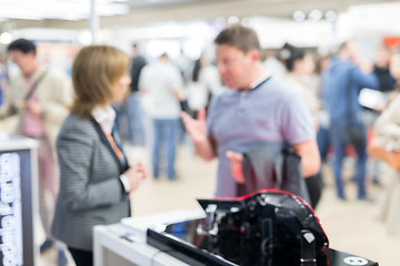 Image showing Blured image of businesspeople socializing and networking at business and entrepreneurship meeting.