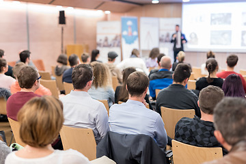 Image showing Business speaker giving a talk at business conference event.