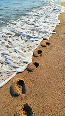 Image showing Footprints on the sandy beach