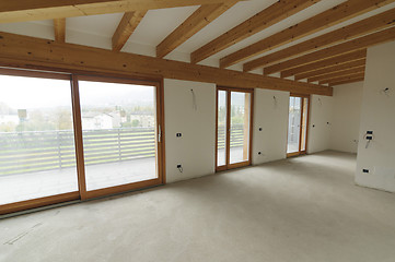 Image showing Home renovation: large open space with exposed wooden beams