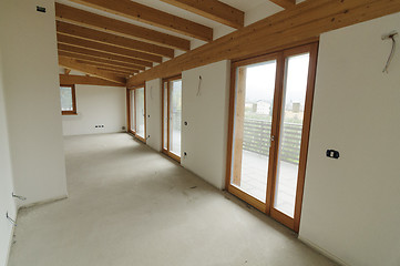 Image showing Home renovation: large open space with exposed wooden beams