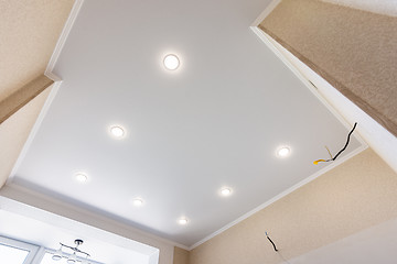 Image showing Stretch ceiling in the kitchen with installed and included spotlights