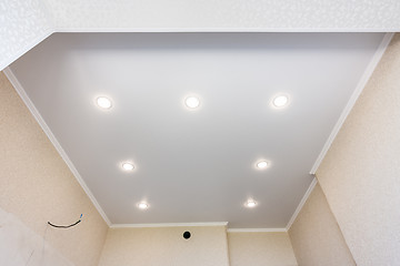 Image showing Stretch ceiling in the kitchen with installed and included spotlights