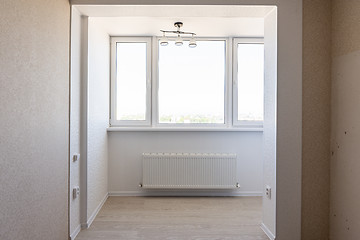 Image showing Redevelopment, combining balconies and kitchens