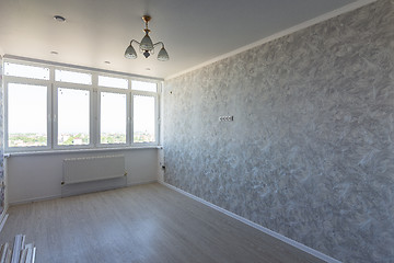 Image showing Empty room in the apartment after repair, with a large wide window