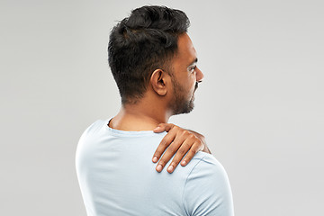 Image showing unhealthy indian man suffering from neck pain