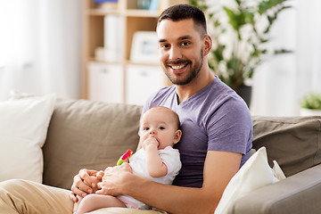 Image showing happy father with little baby daughter at home