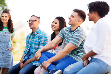 Image showing happy international friends in park