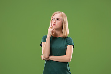 Image showing Young serious thoughtful business woman. Doubt concept.