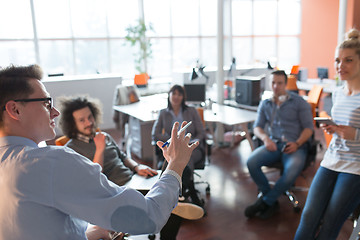 Image showing Young Business Team At A Meeting at modern office building