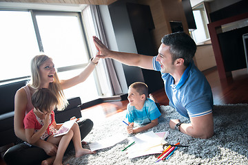 Image showing young couple spending time with kids