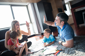 Image showing young couple spending time with kids