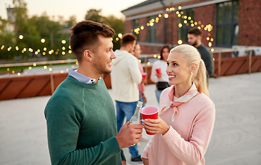 Image showing friends with non alcoholic drinks at rooftop party