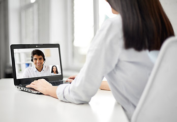 Image showing businesswoman having video call on laptop