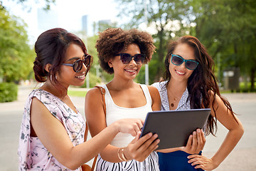 Image showing women with tablet pc on street in summer