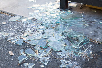 Image showing shards of broken glass on floor