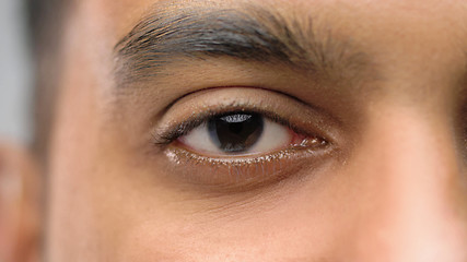 Image showing close up of south asian male eye with brown iris