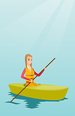 Image showing Young caucasian woman travelling by kayak.