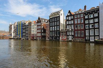 Image showing Dancing Canal Houses of Damrak, Amsterdam, Netherlands