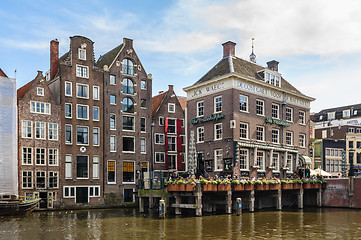 Image showing Dancing Canal Houses of Damrak, Amsterdam, Netherlands