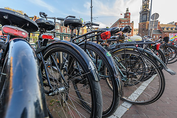 Image showing A lot of bicycles in a typical Amsterdam bike parking