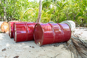 Image showing oil drum barrels on beach in french polynesia