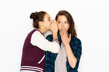 Image showing teenage girls gossiping or sharing secrets