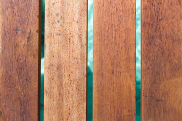 Image showing close up of wooden pier boards over water