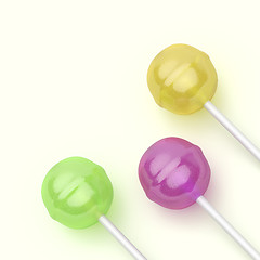 Image showing Three lollipops with different colors
