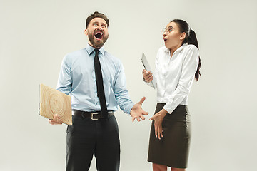 Image showing Winning success woman and man happy ecstatic celebrating being a winner.