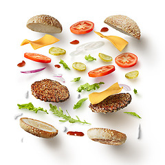 Image showing burger with flying ingredients
