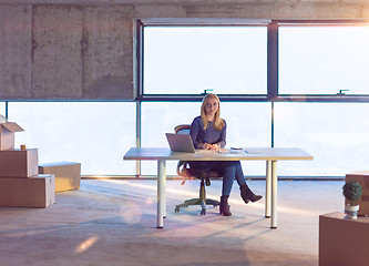 Image showing young female architect on construction site