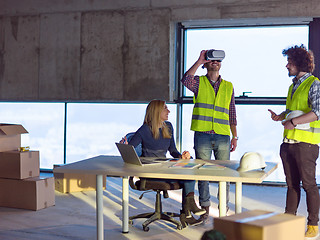 Image showing group of business people,architect and engineer on construction 