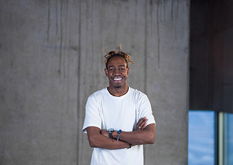 Image showing portrait of young black male architect on construction site